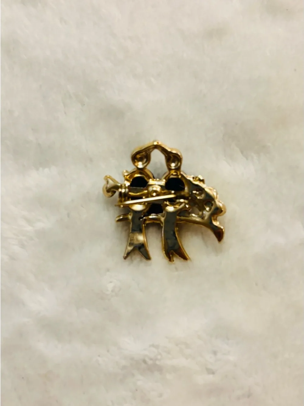 Source Unknown gold tone