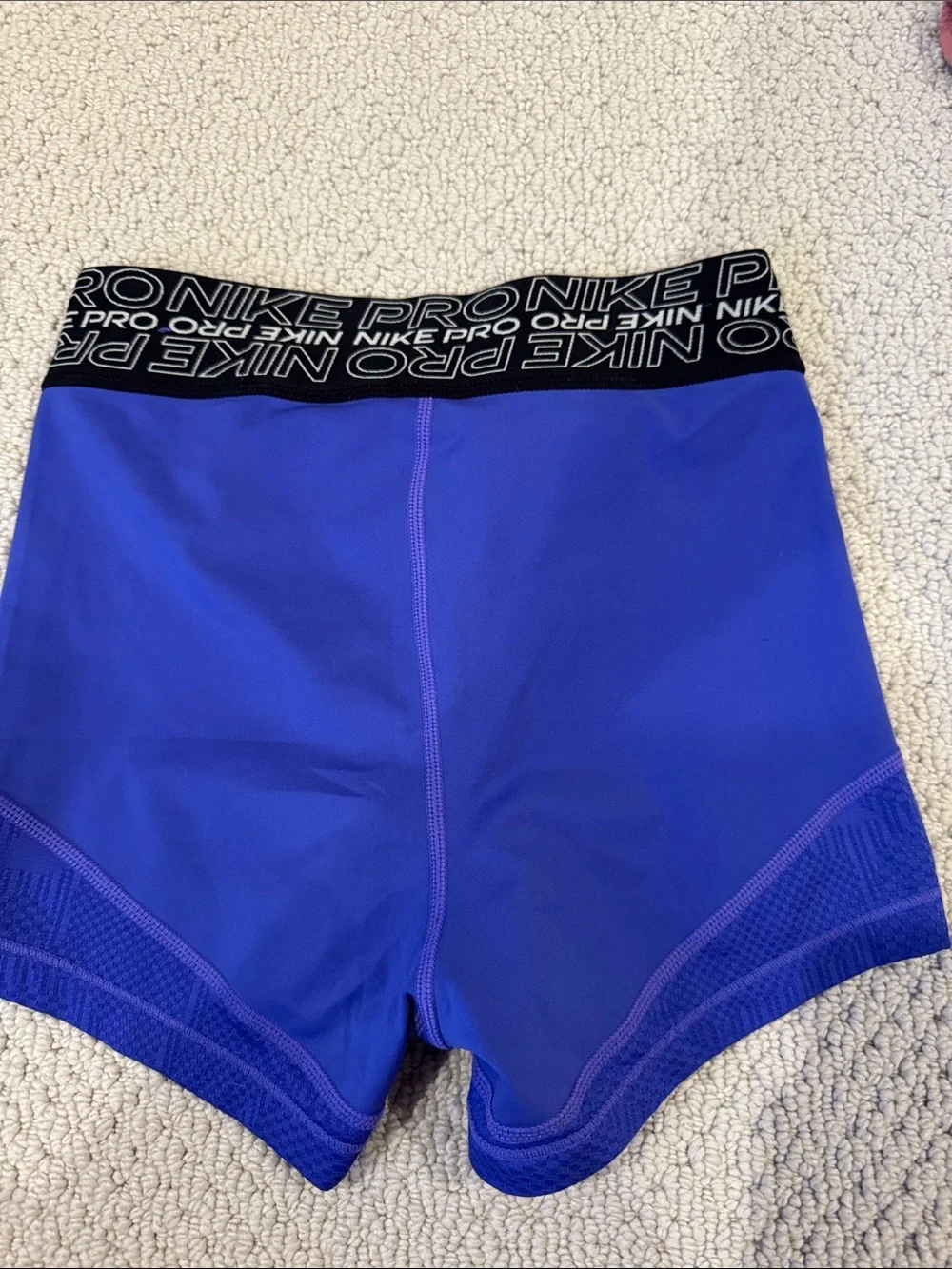 Nike Women's Royal Blue Athletic Compression Shorts with Black Logo Waistband