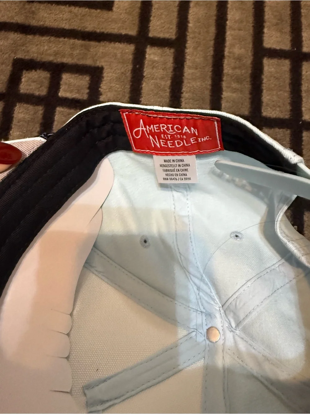 American Needle Light Blue and Black Baseball Cap with Red Label
