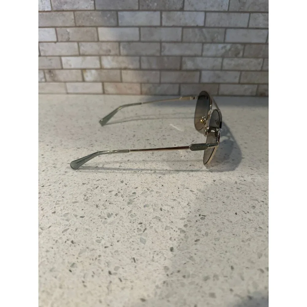 COACH WOMEN SUNGLASSES HC7140 CD474‎ Shiny Light Gold / Grey Gradient Polarized