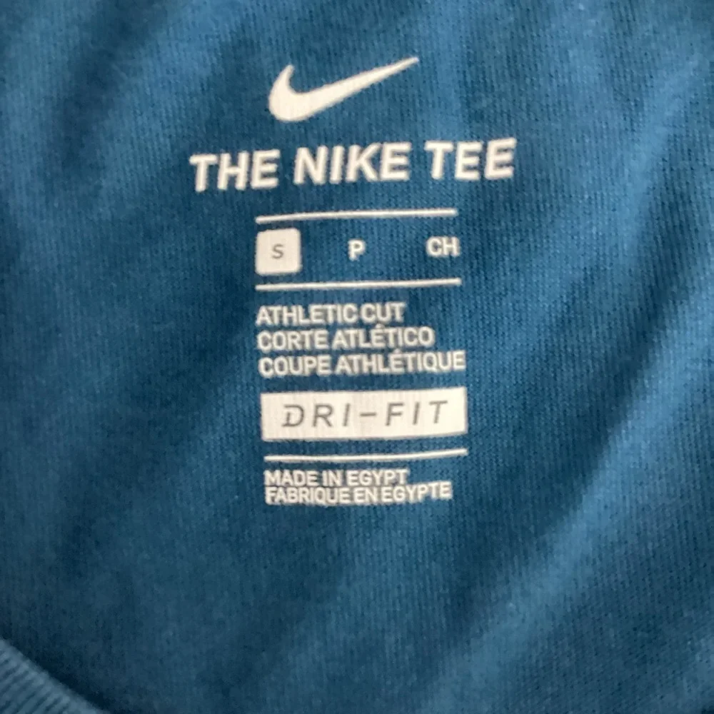 Nike slogan brand top