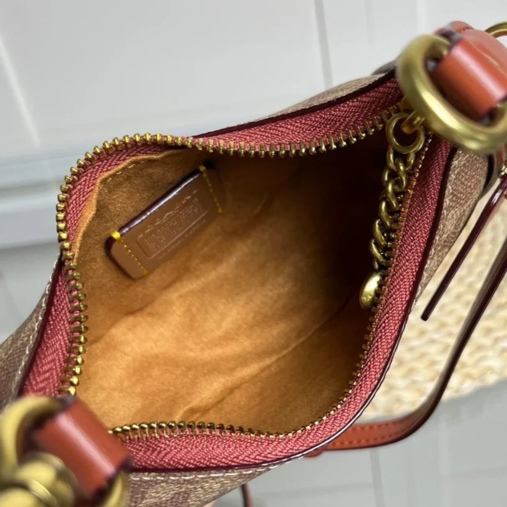 Coach Brown Signature Crescent Shoulder Bag with Rust Trim