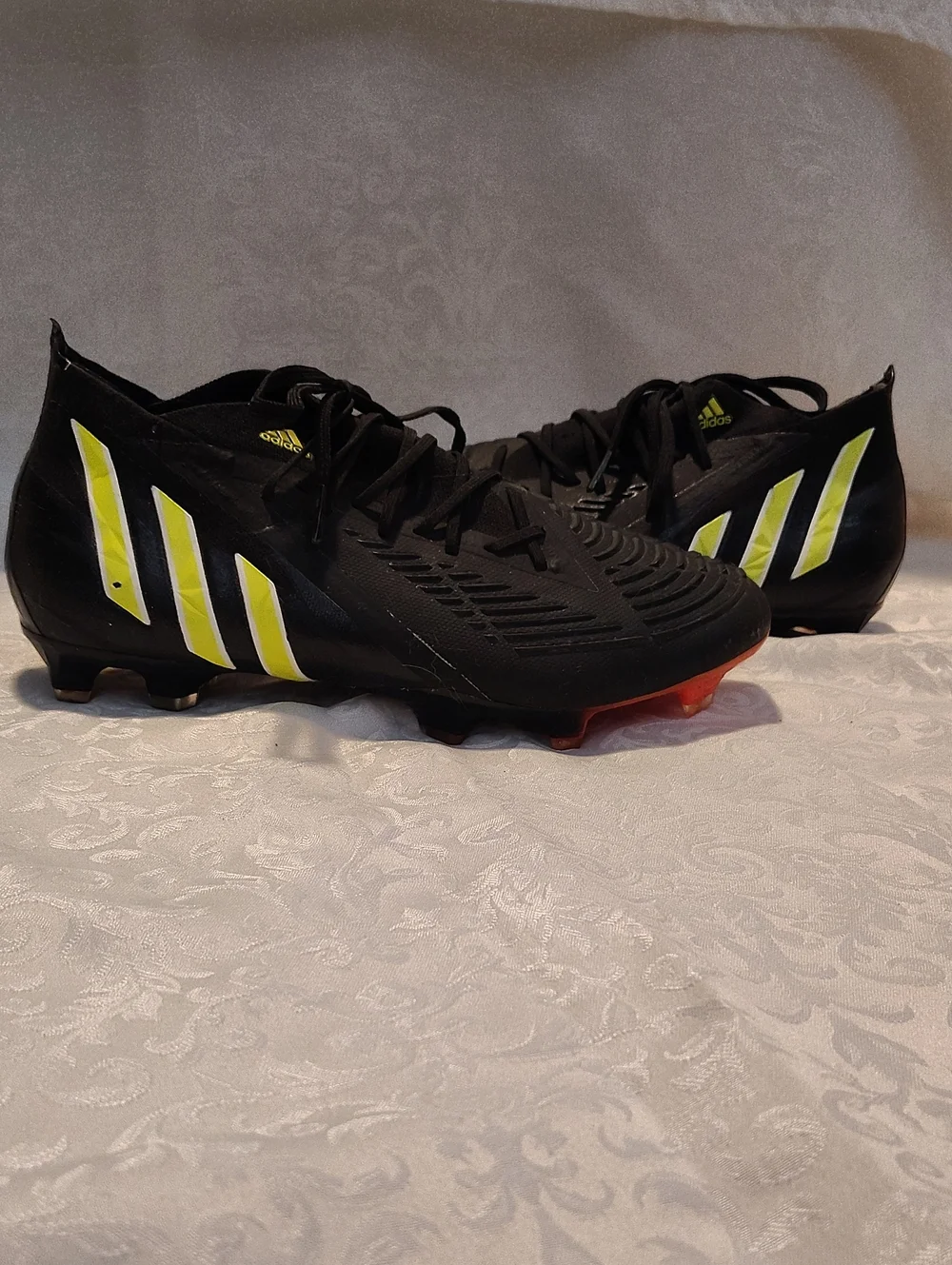 Adidas Men’s Black Soccer Cleats with Neon Yellow Stripes