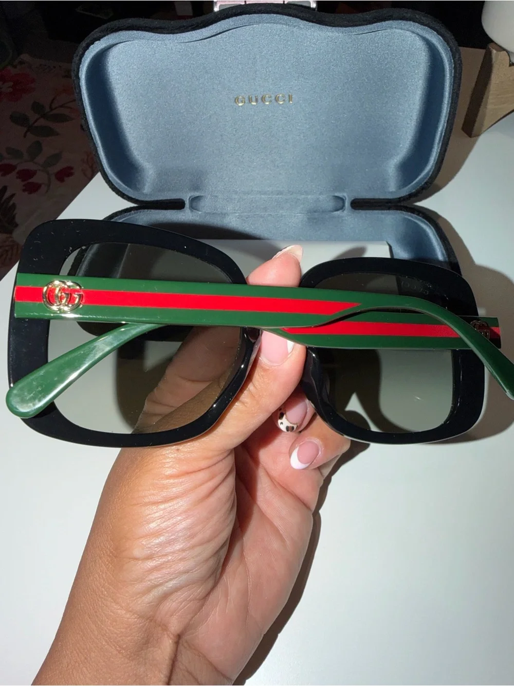 Gucci Women’s Black Frames with Green and Red Stripe Temples Sunglasses