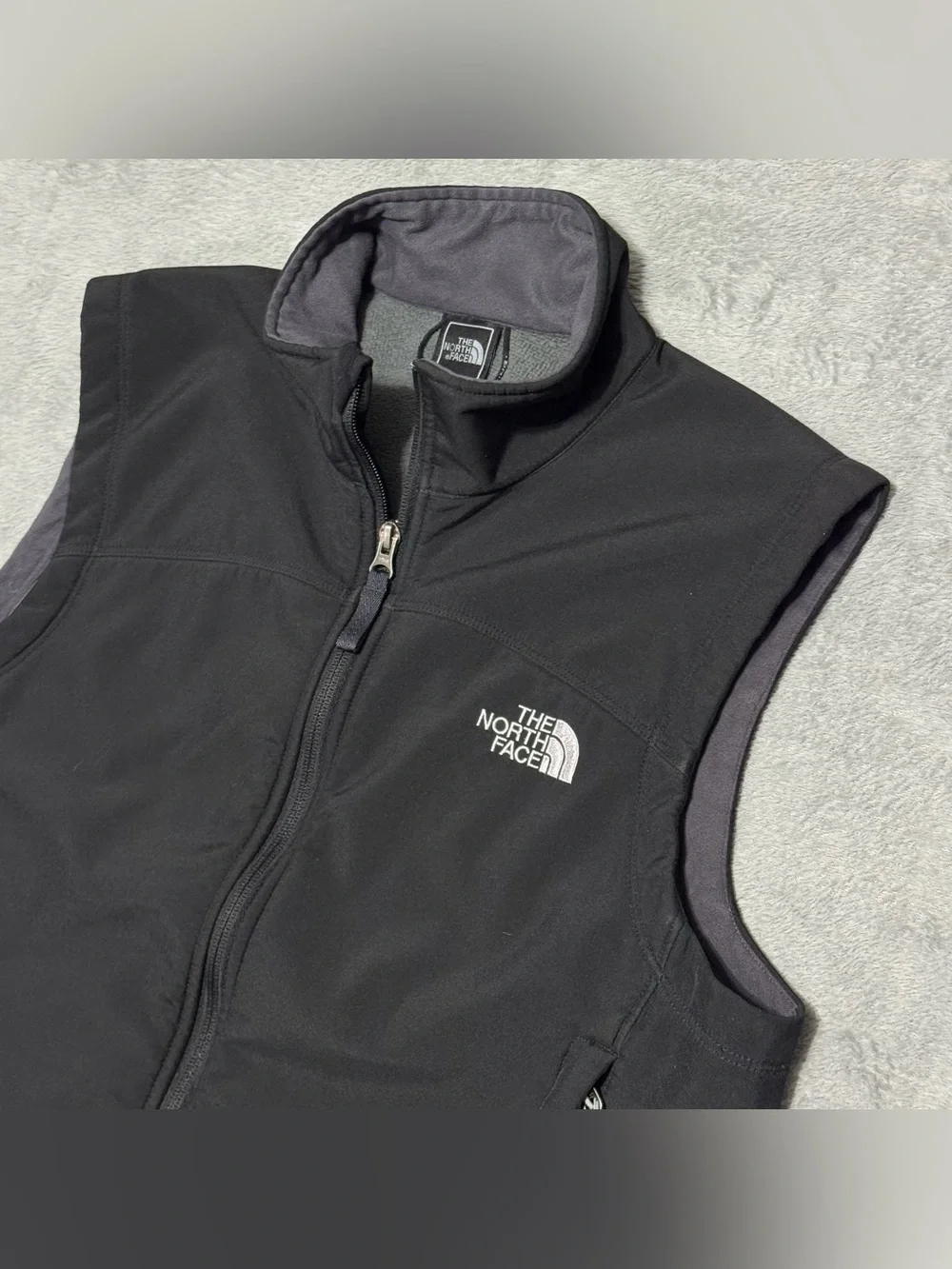 The North Face hand adjustable signs