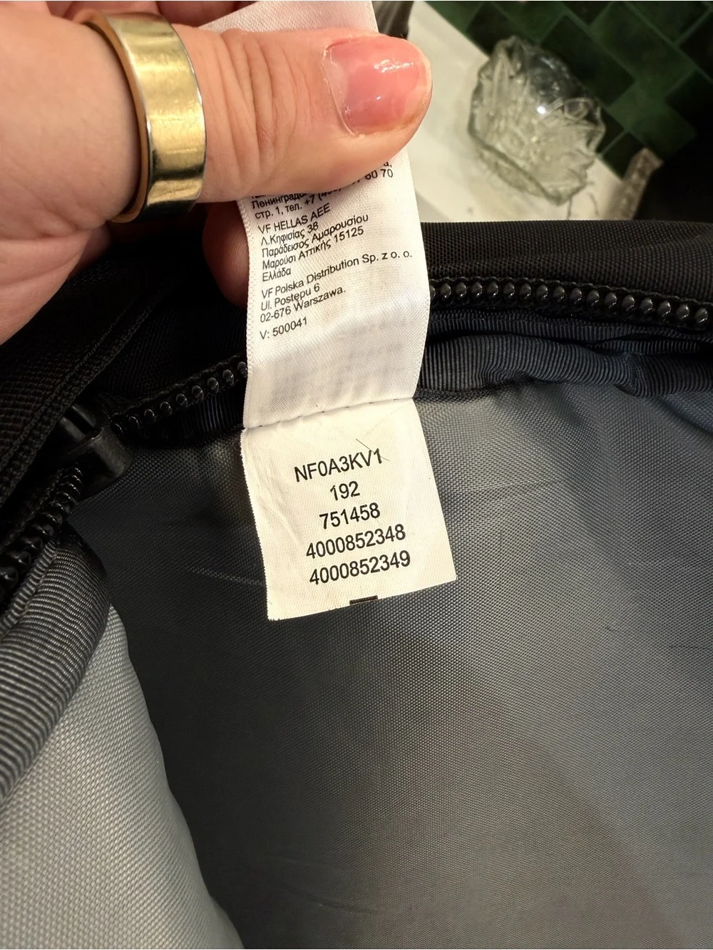 The North Face Black Backpack with Front Pocket and Buckle Straps