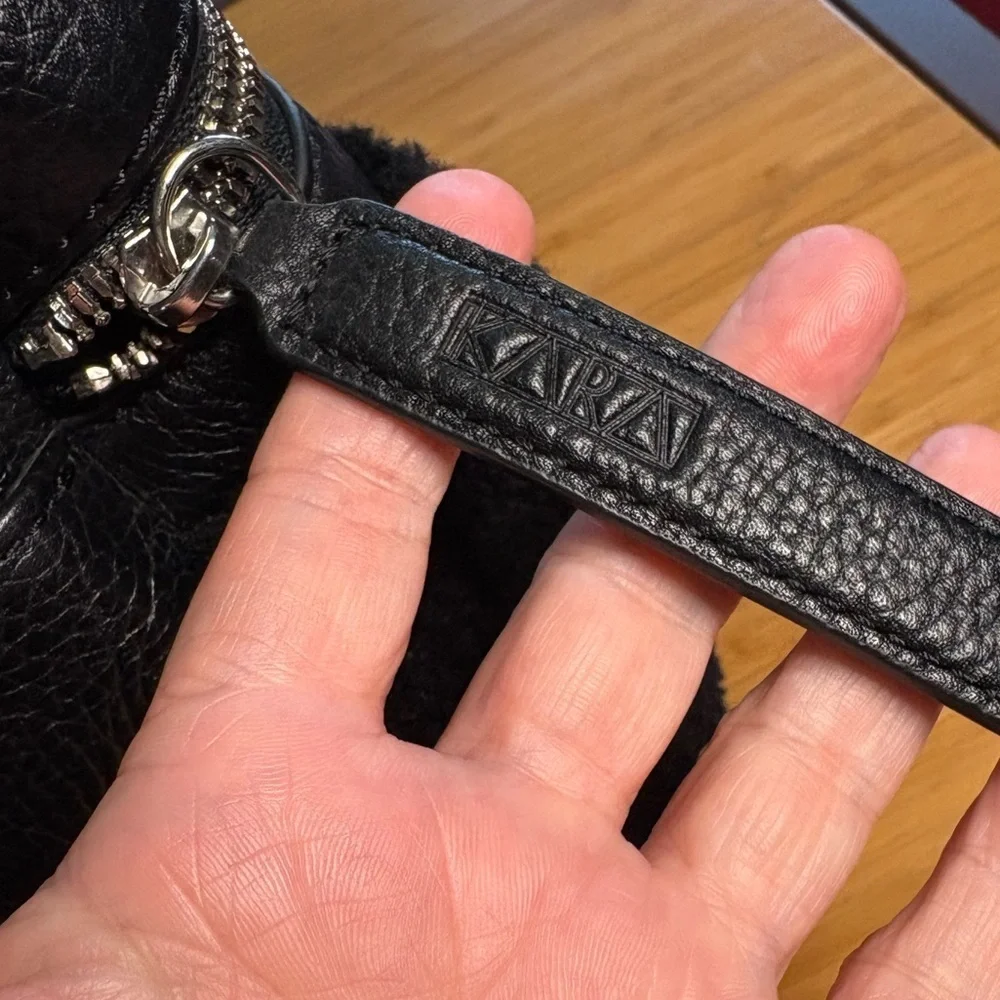 EUC KARA- Small Backpack in Black Shearling and Pebbled Leather.