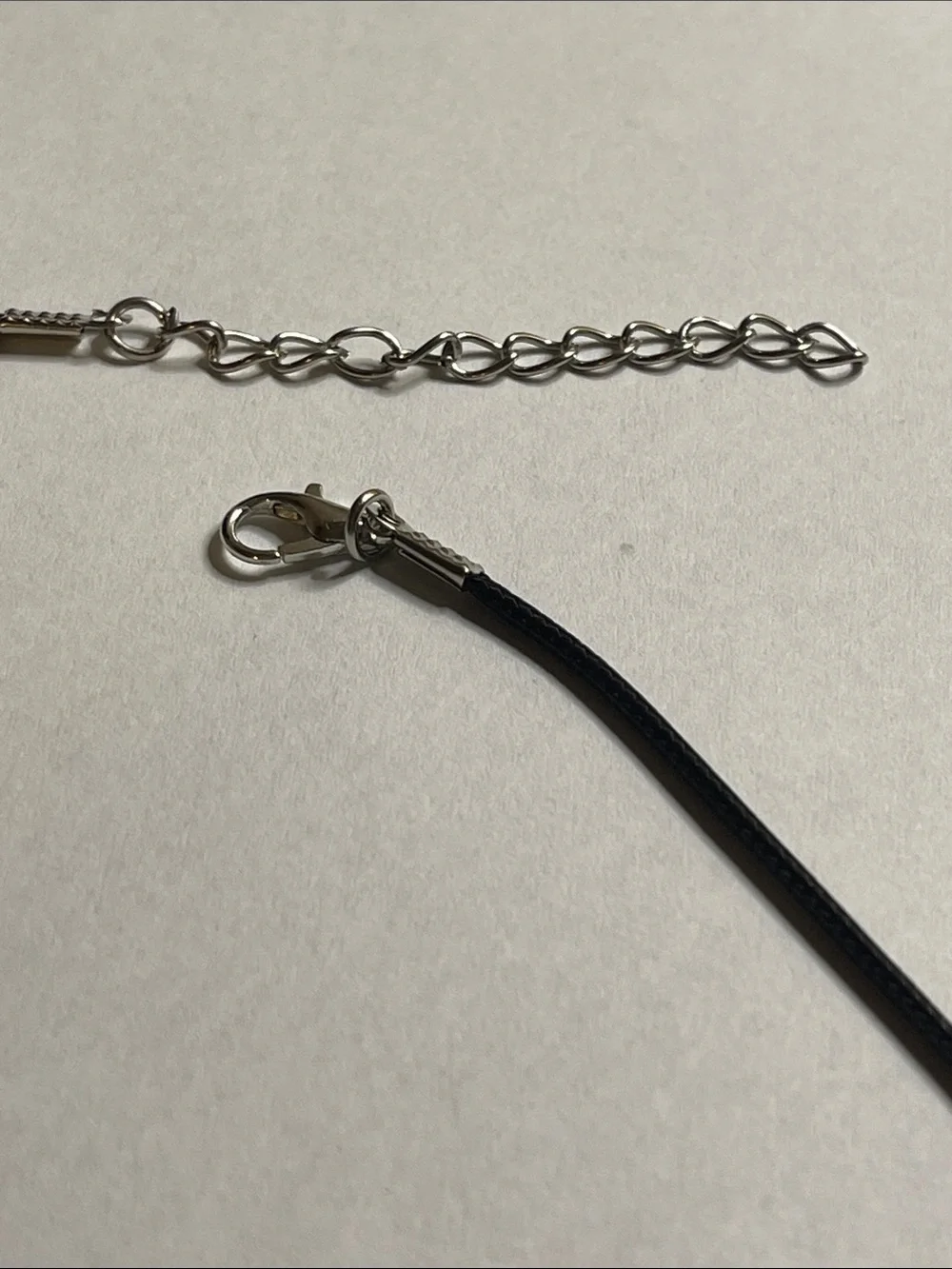 Coach cord necklaces