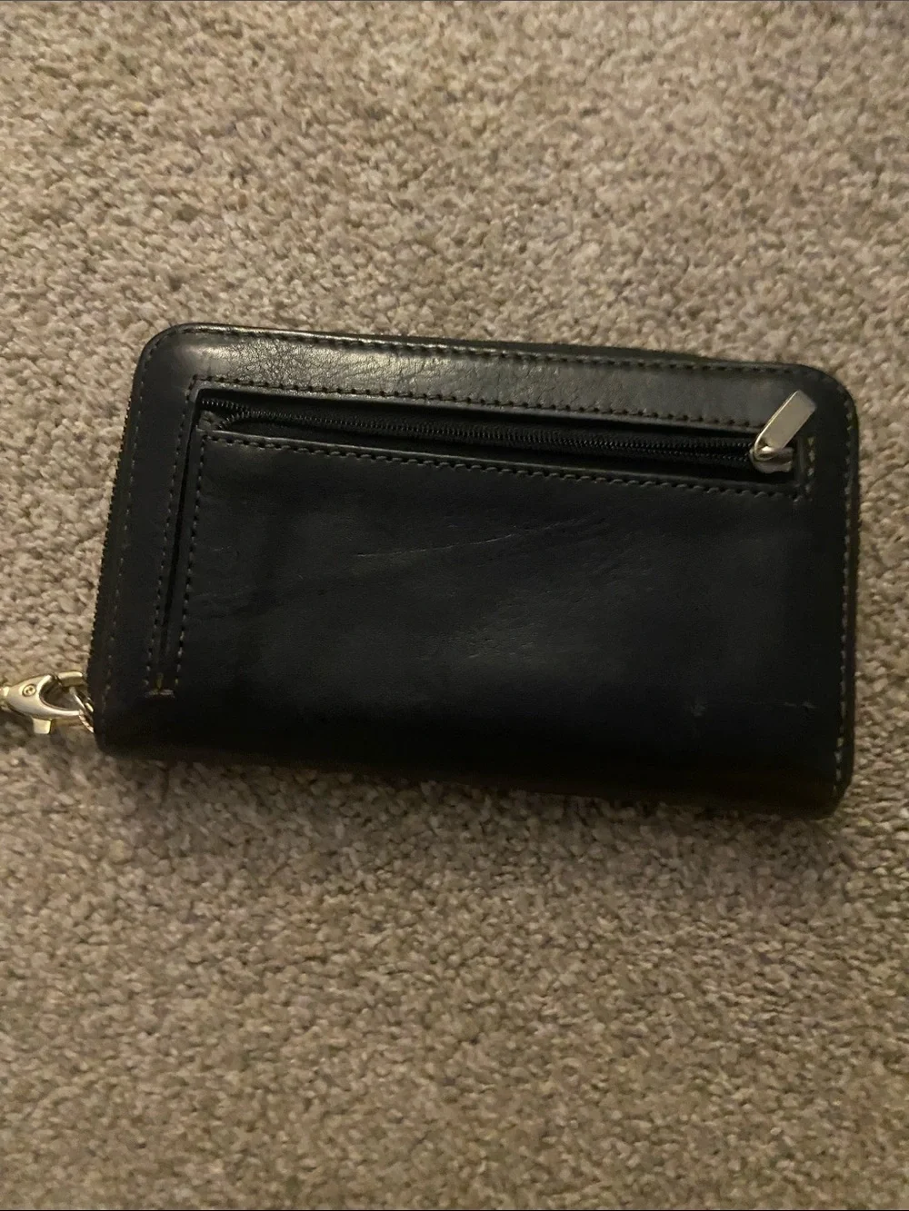 Fossil Black Leather Zip Wristlet with Gold Accent, gently used lots of life.