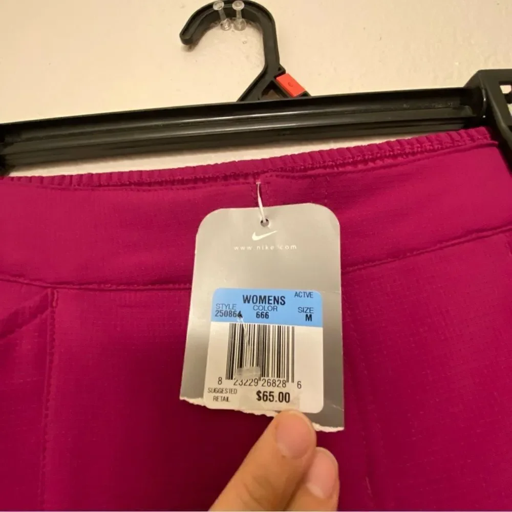 Nike womans hot pink Tech Marching Band Pants hot pink yellow pinstripe M 8-10