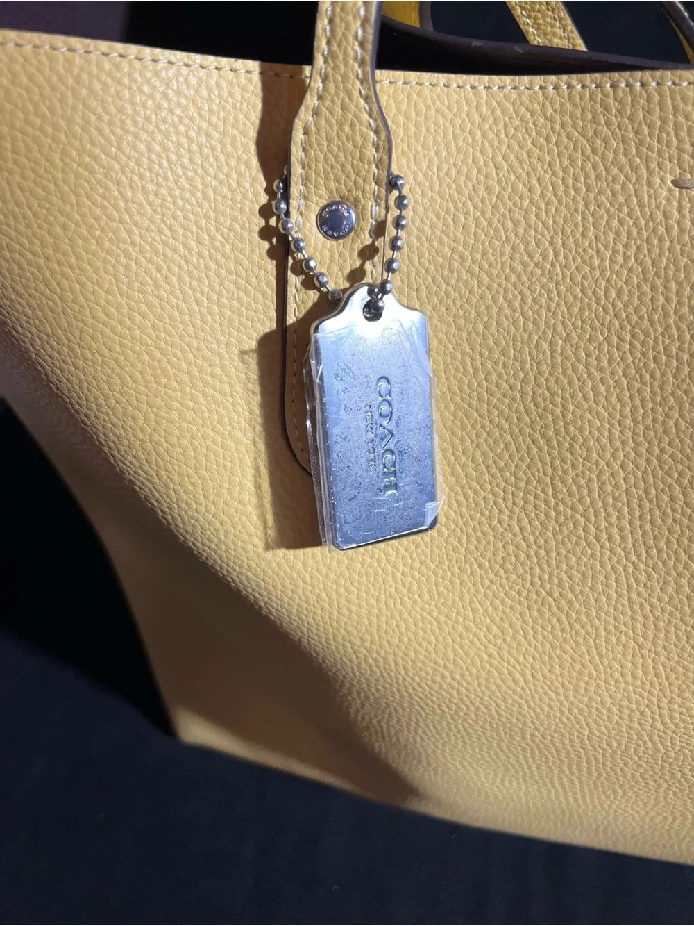 Coach bright yellow