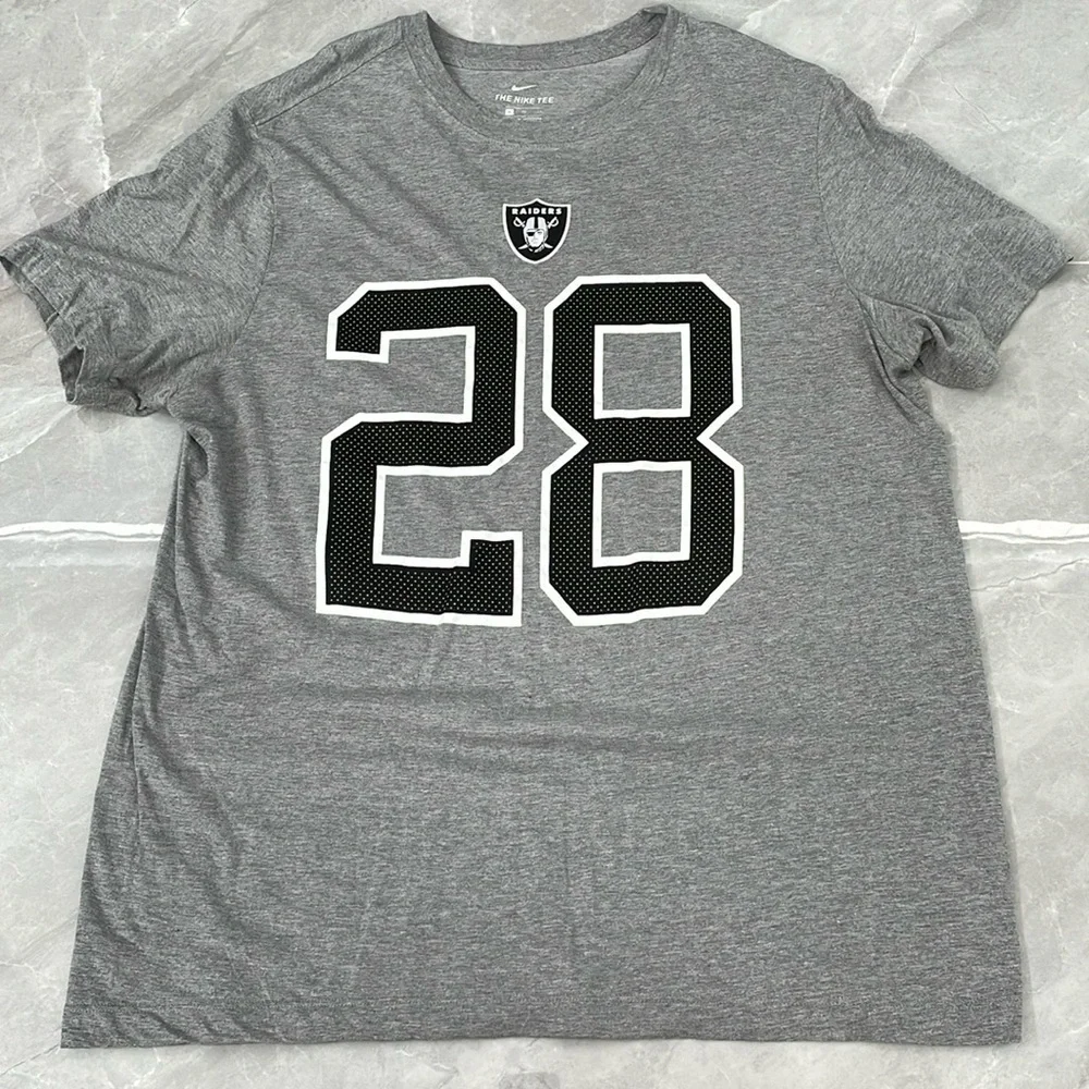 Men’s The Nike Tee Raiders Josh Jacobs #28 Short Sleeve Shirt XL