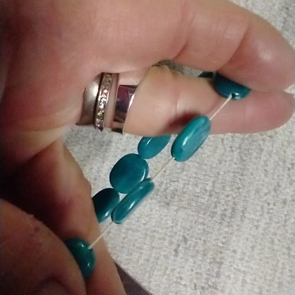 Greenish blue beaded stretch bracelet