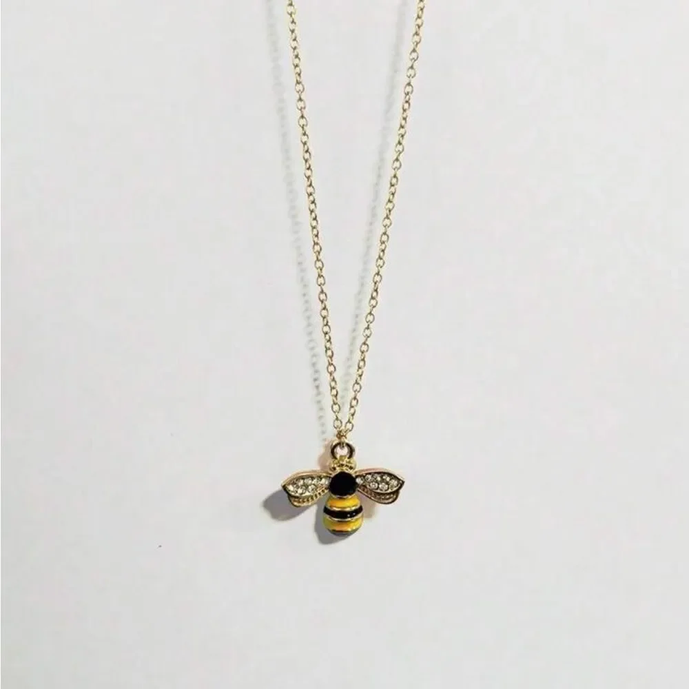 Anthropologie charming gold