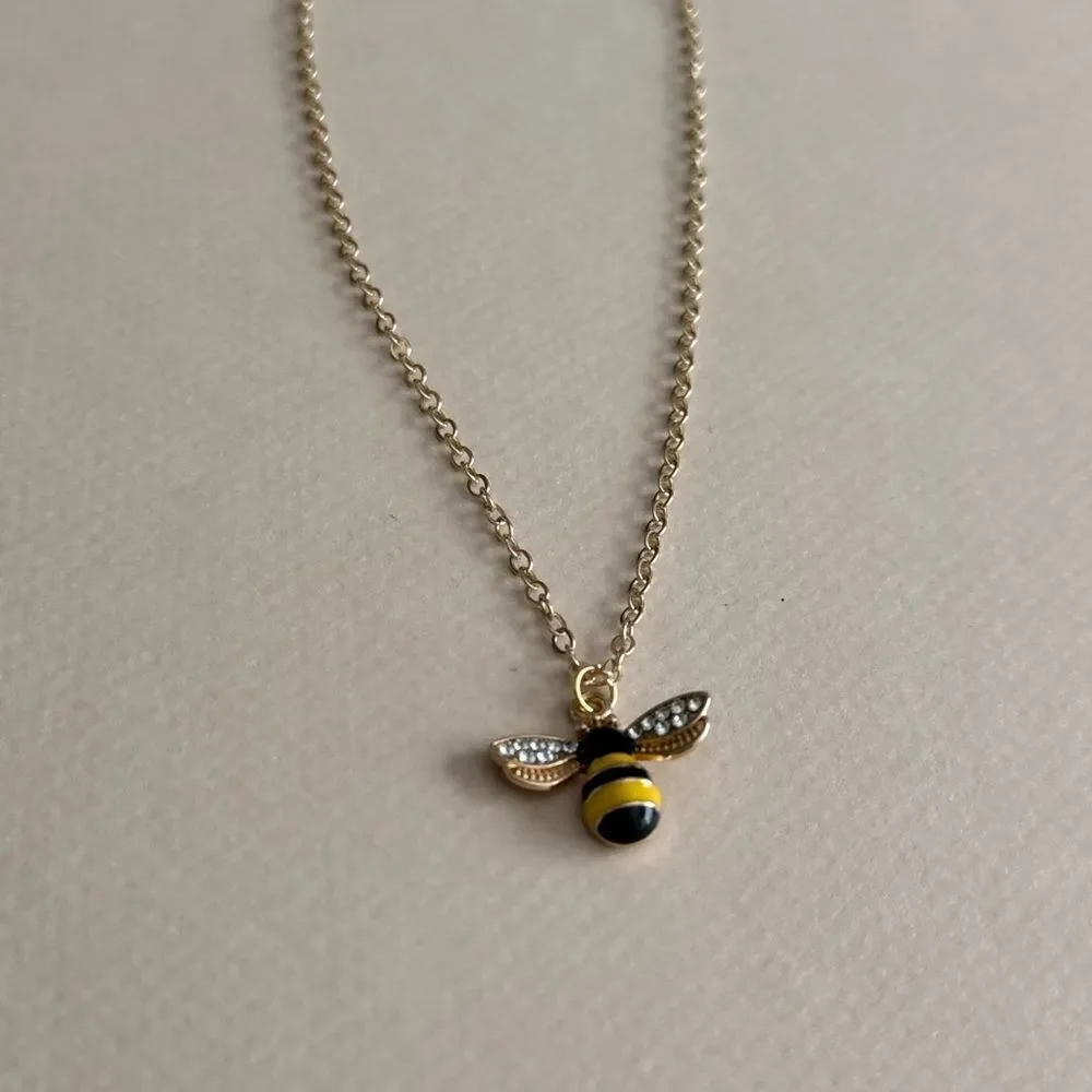 Anthropologie charming gold