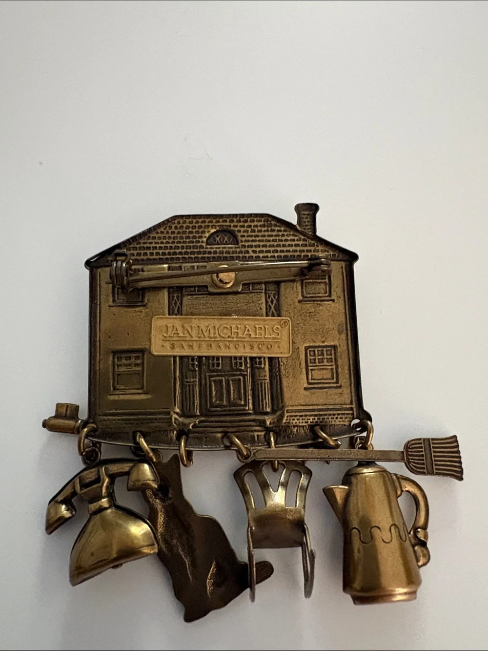 Jan Michaels brass tone