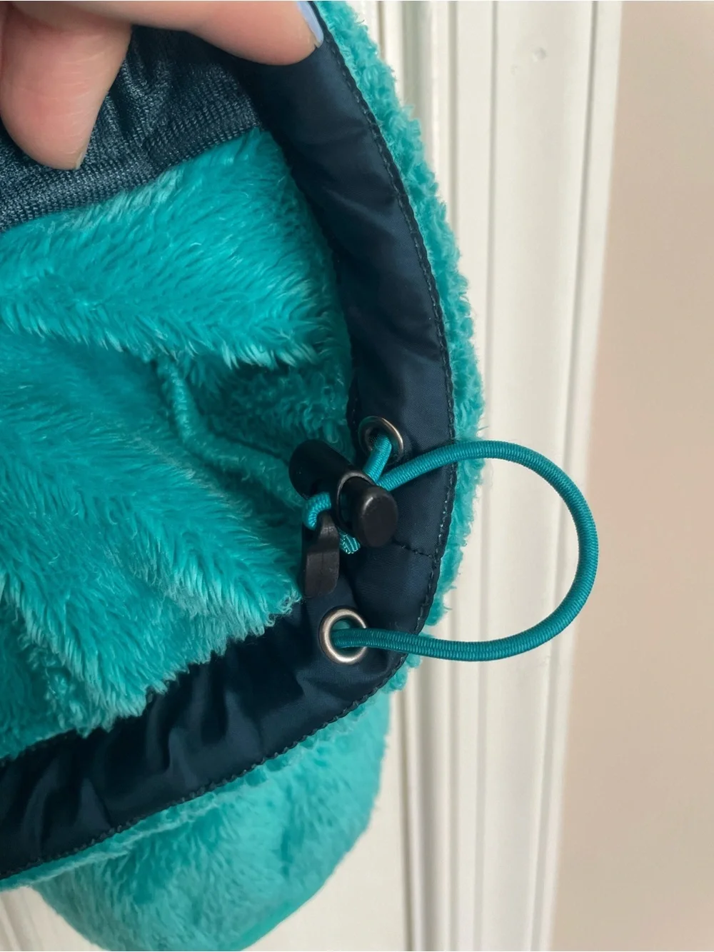The North Face soft teal