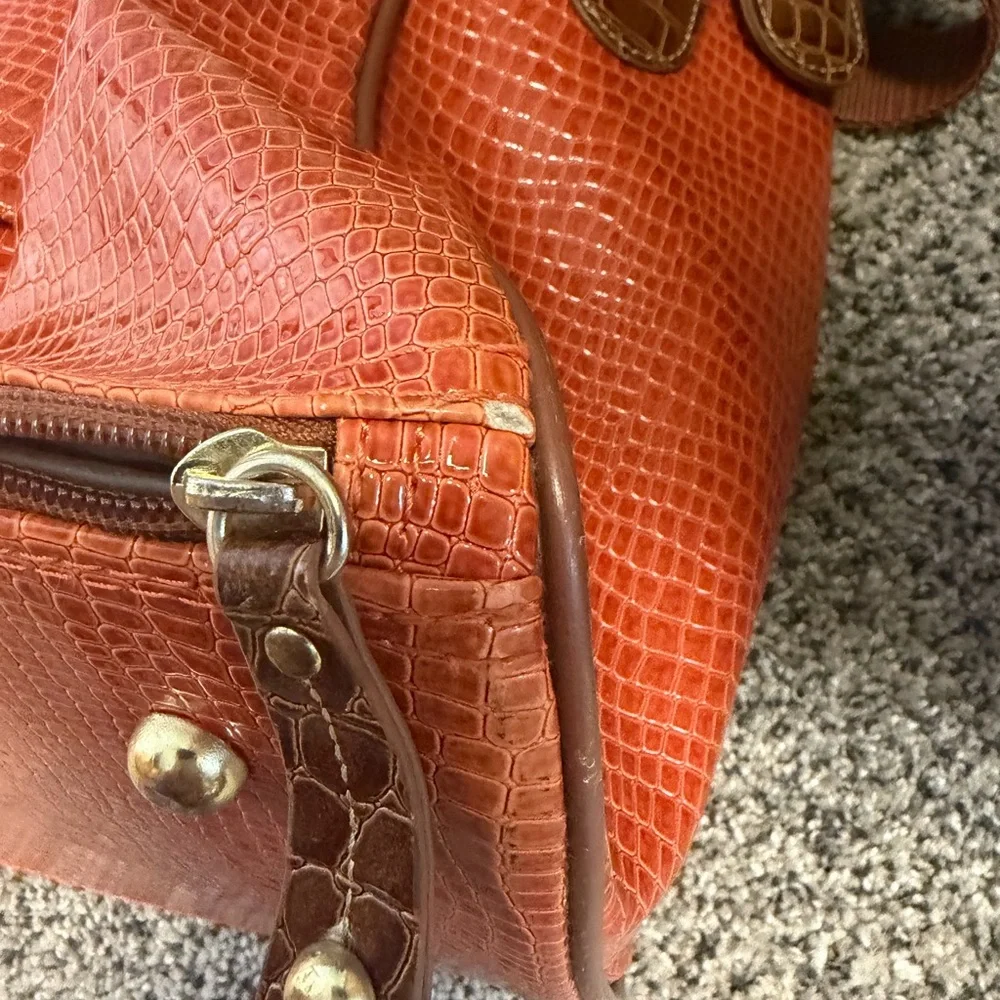 Samantha Brown stylish orange