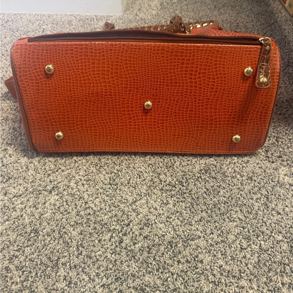 Samantha Brown stylish orange