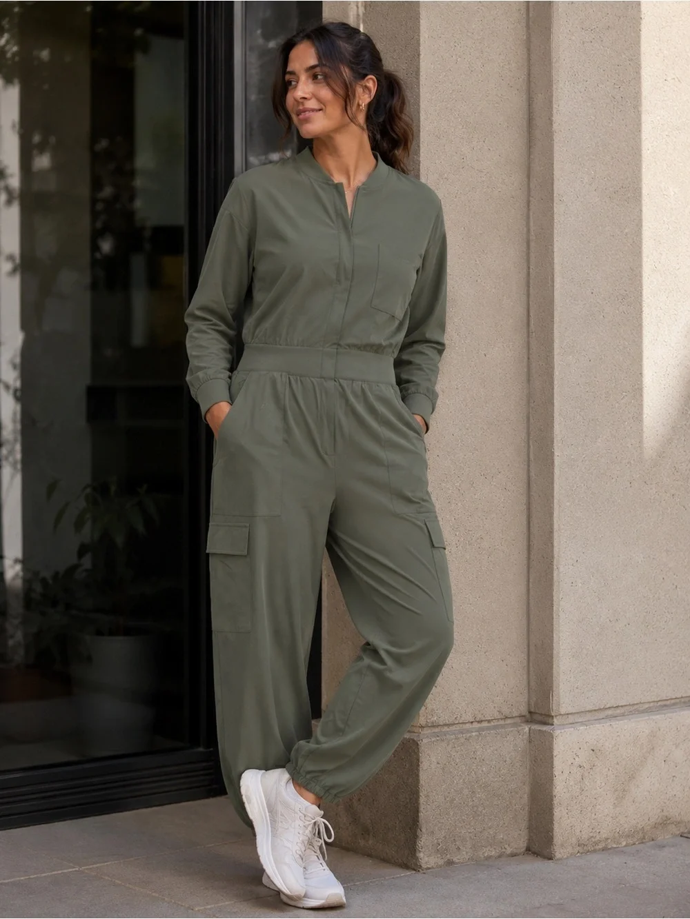Athleta Brooklyn long sleeve jumpsuit. Size 16 deep green NWT.
