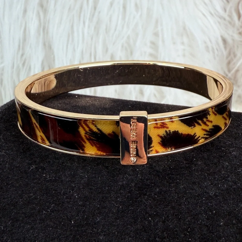 Beautiful, goldtone, animal print nine west bangle bracelet