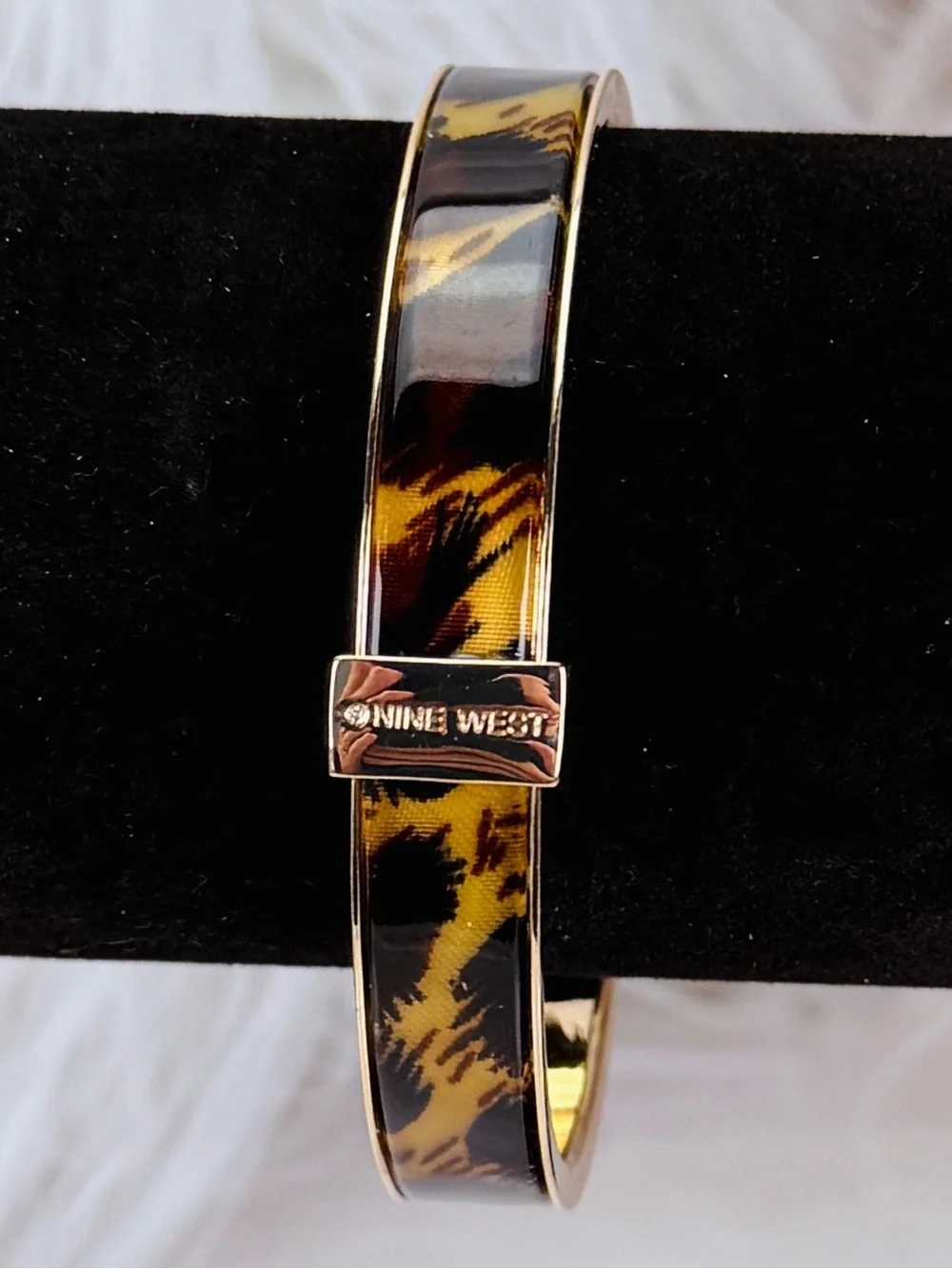 Beautiful, goldtone, animal print nine west bangle bracelet