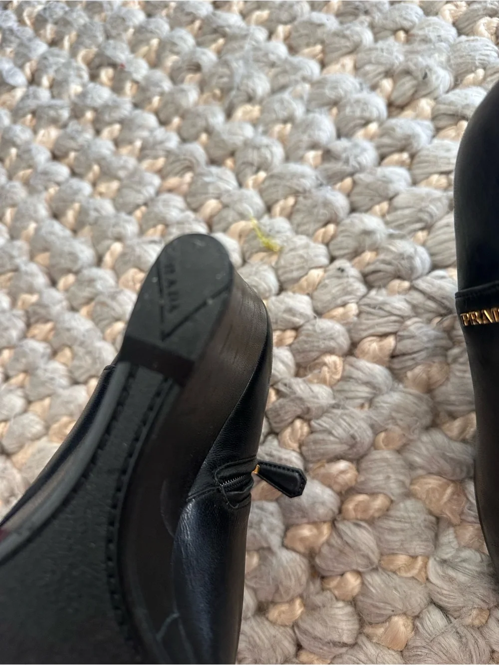 Prada booties have peep