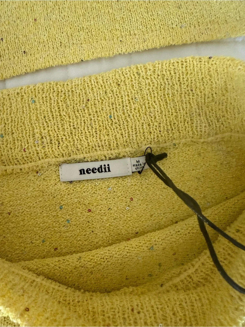 Needii soft yellow