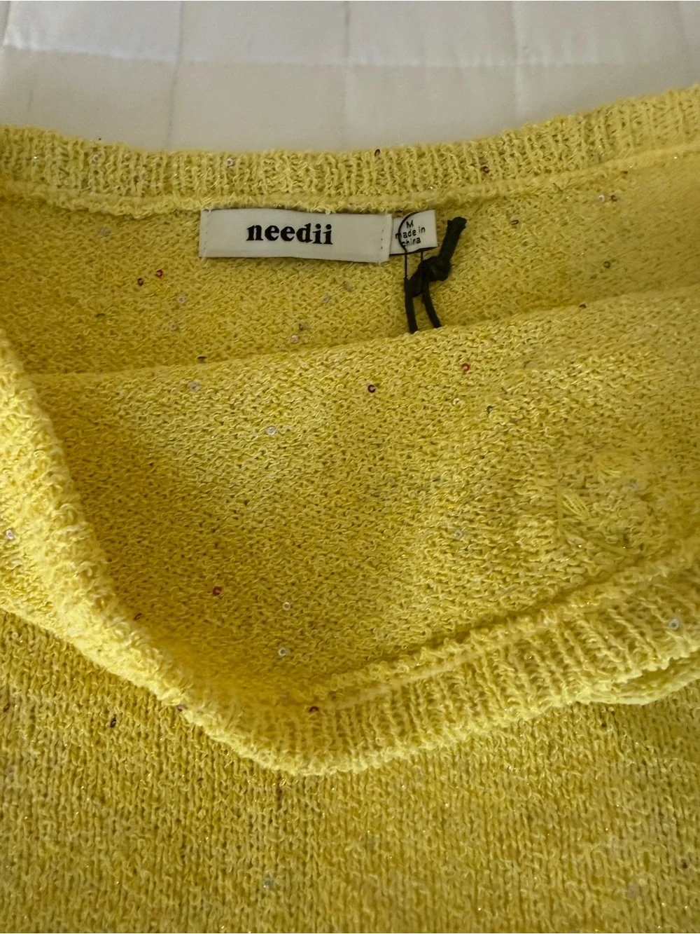 Needii soft yellow