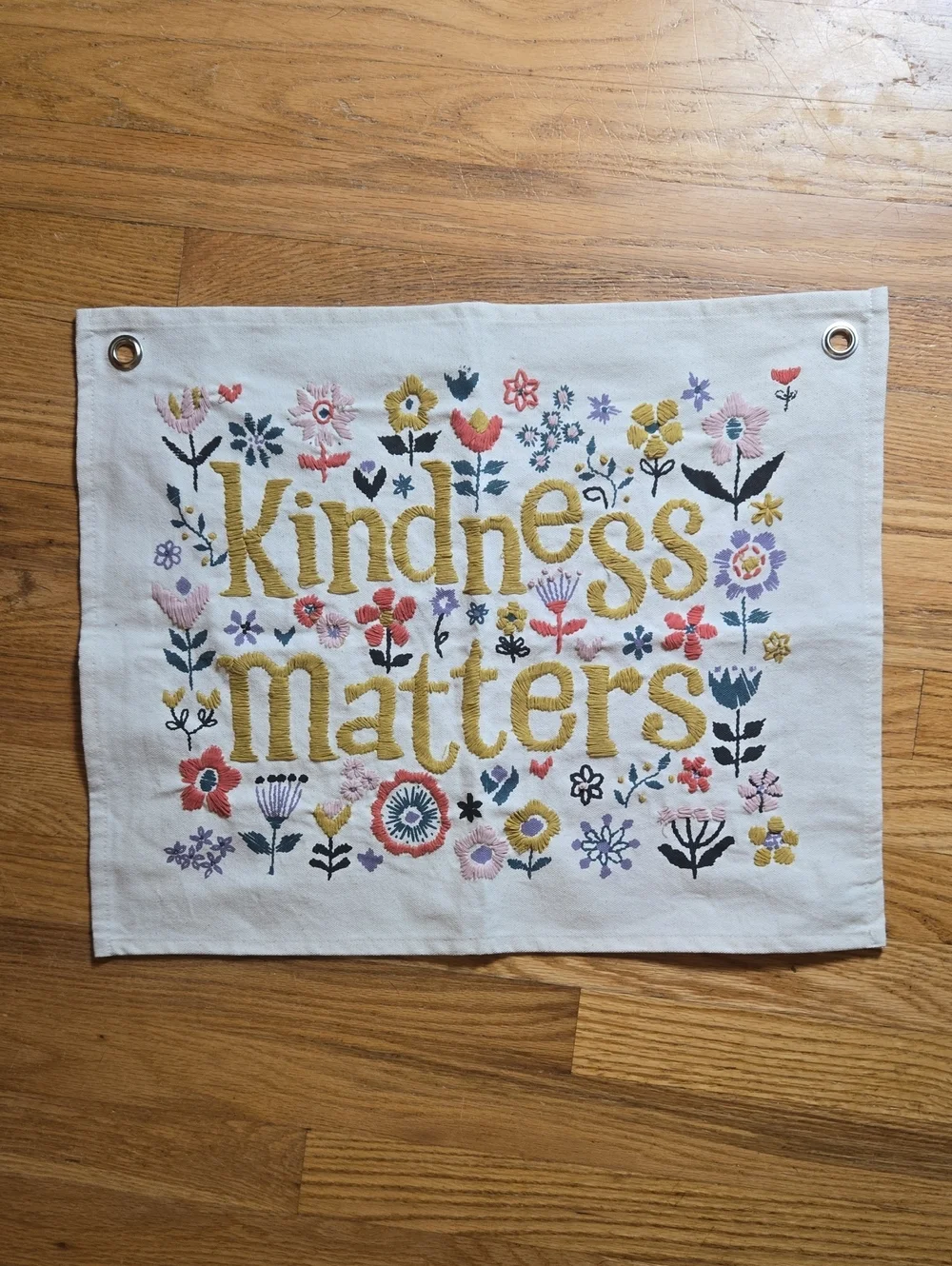 Urban Outfitters UO Home 'Kindness Matters' canvas tapestry wall hanging
