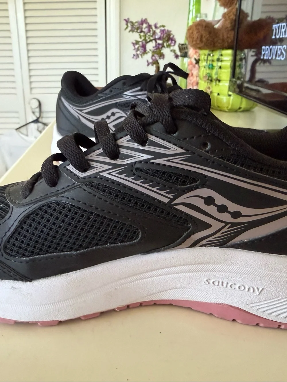 Saucony Women's Cohesion Running Sneakers in Black and Light Pink