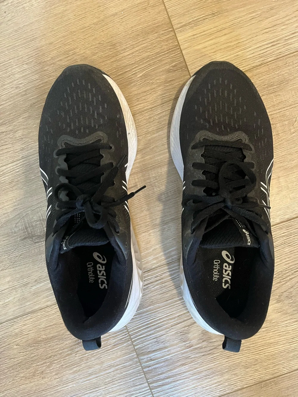 ASICS women’s Black and White Athletic Running Shoes