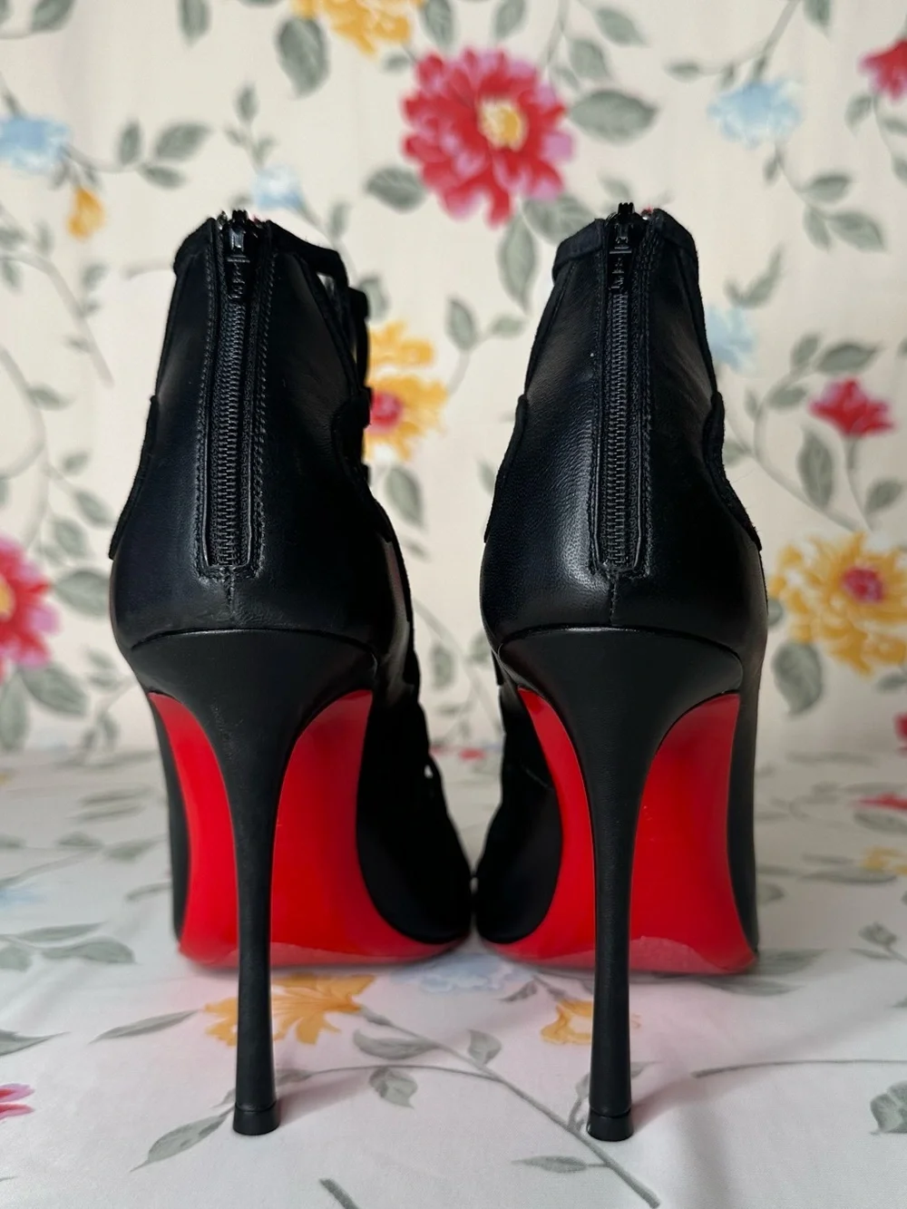Christian Louboutin bold ripped slightly