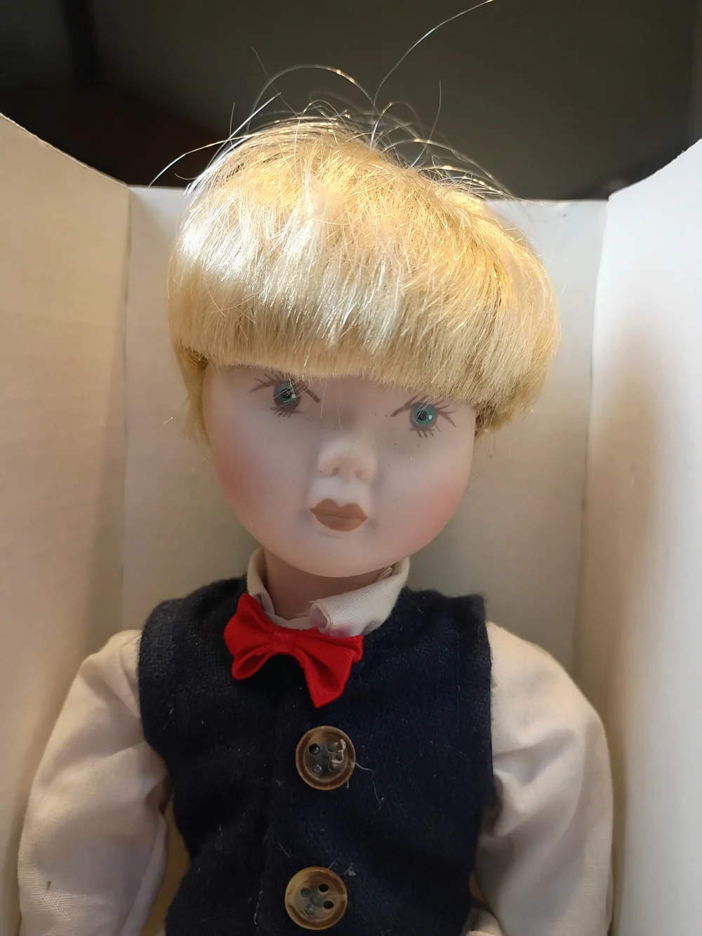 #6017 Blonde Porcelain Doll with Red Bow Tie