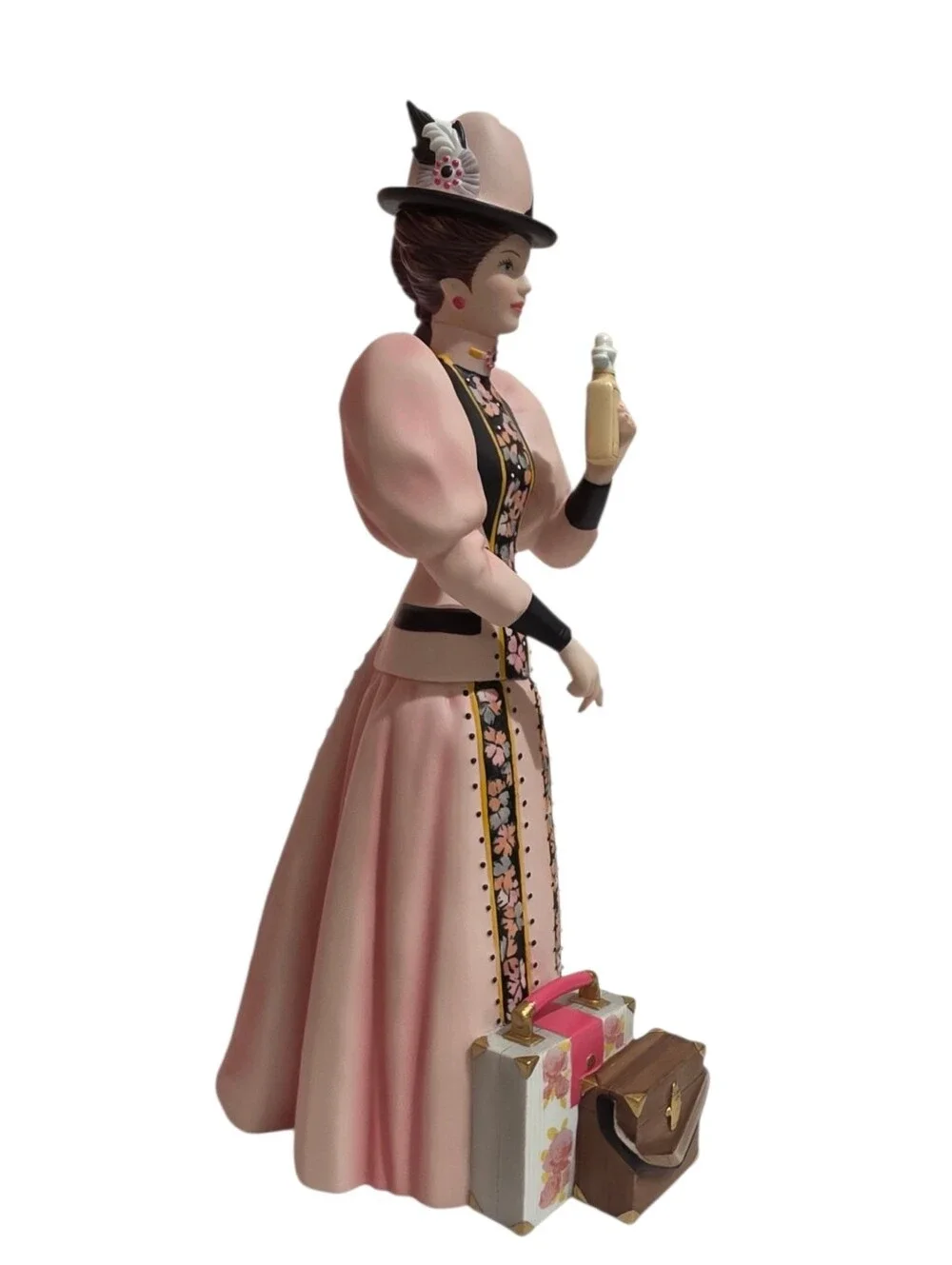 2004 Avon Mrs. PFE Albee President's Club Award porcelain figurine.