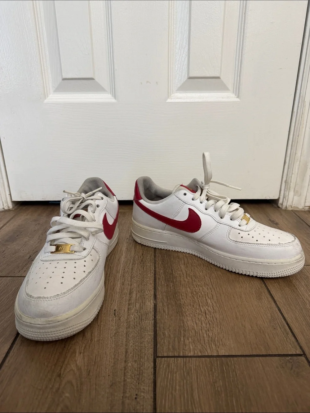 Nike Air Force 1 '07 ESS White Sneakers with Red Swoosh