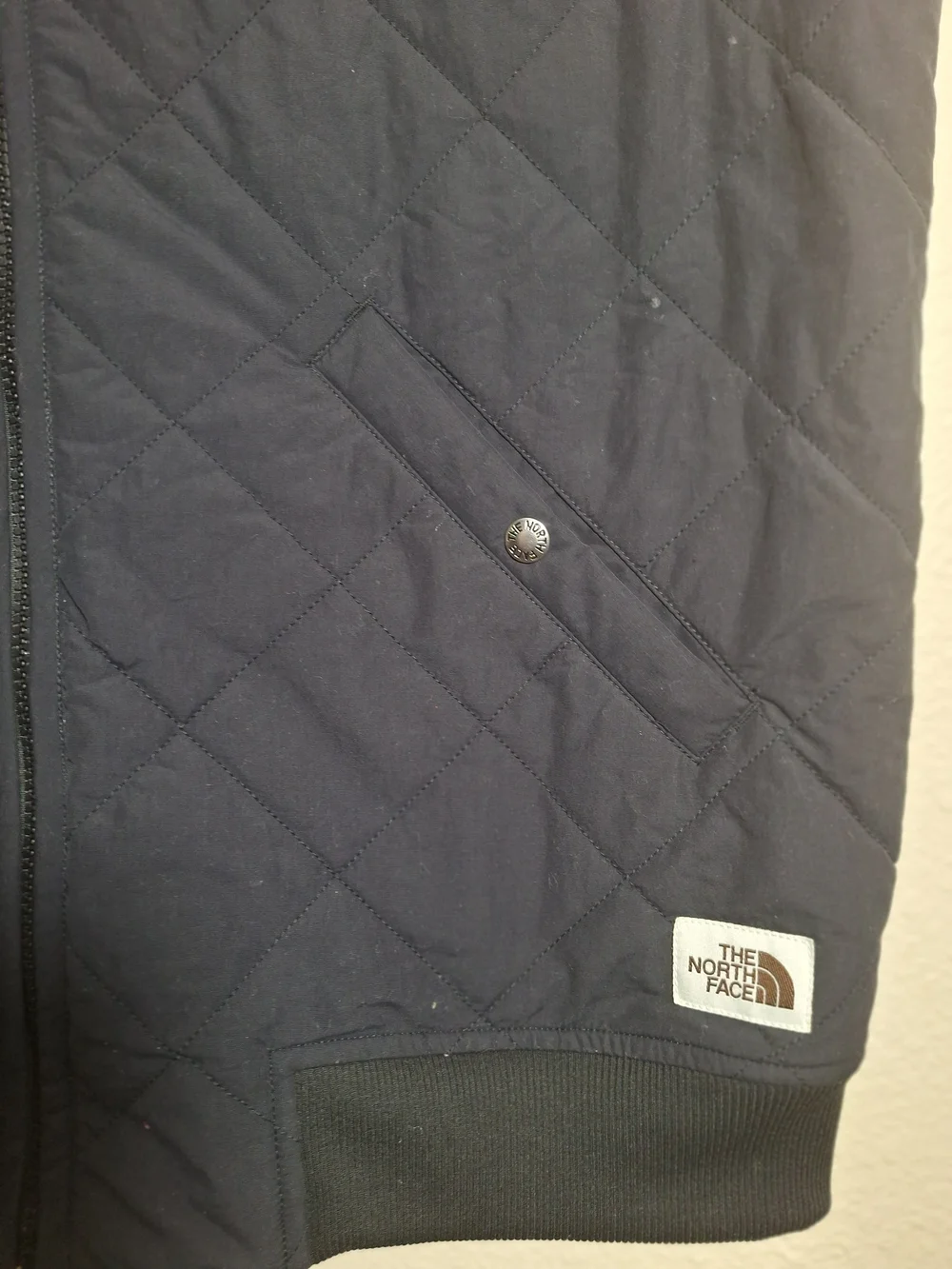 The North Face quilted sleeveless