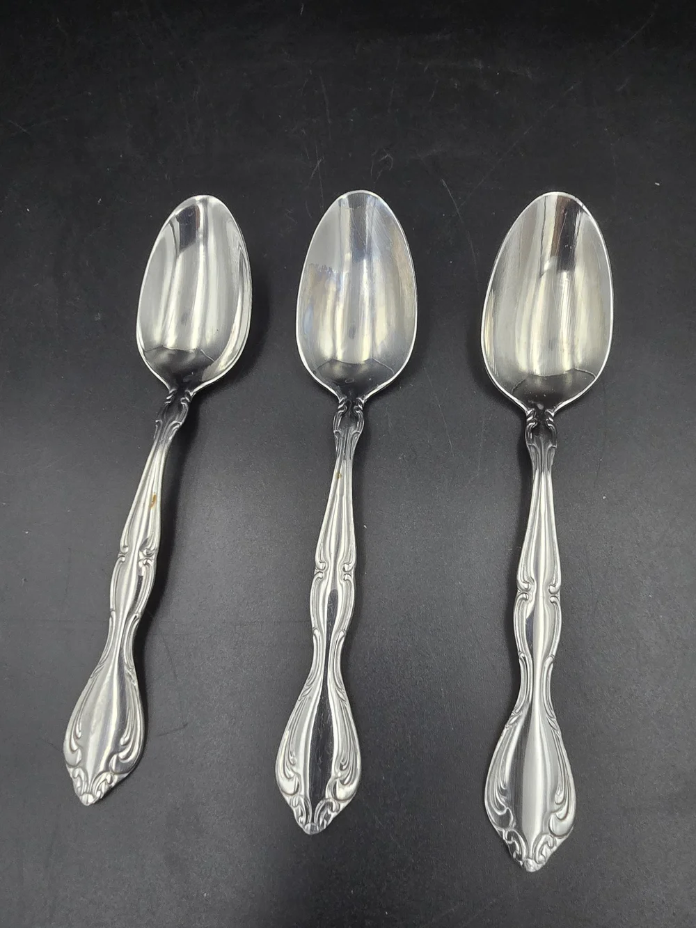 Oneida Silver Tone Ornate Serving Spoon