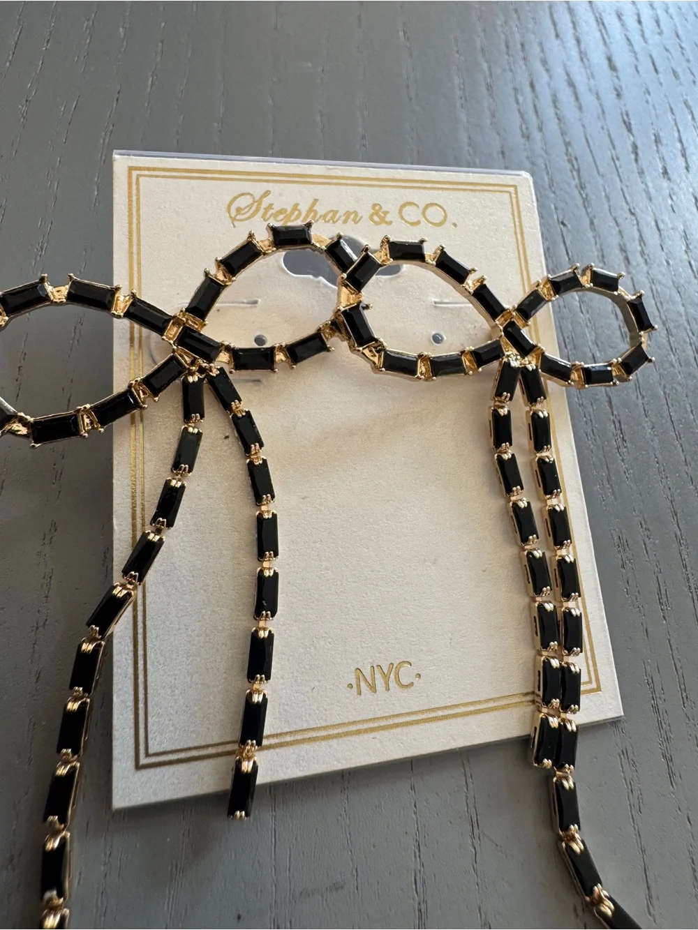 N/A black bow