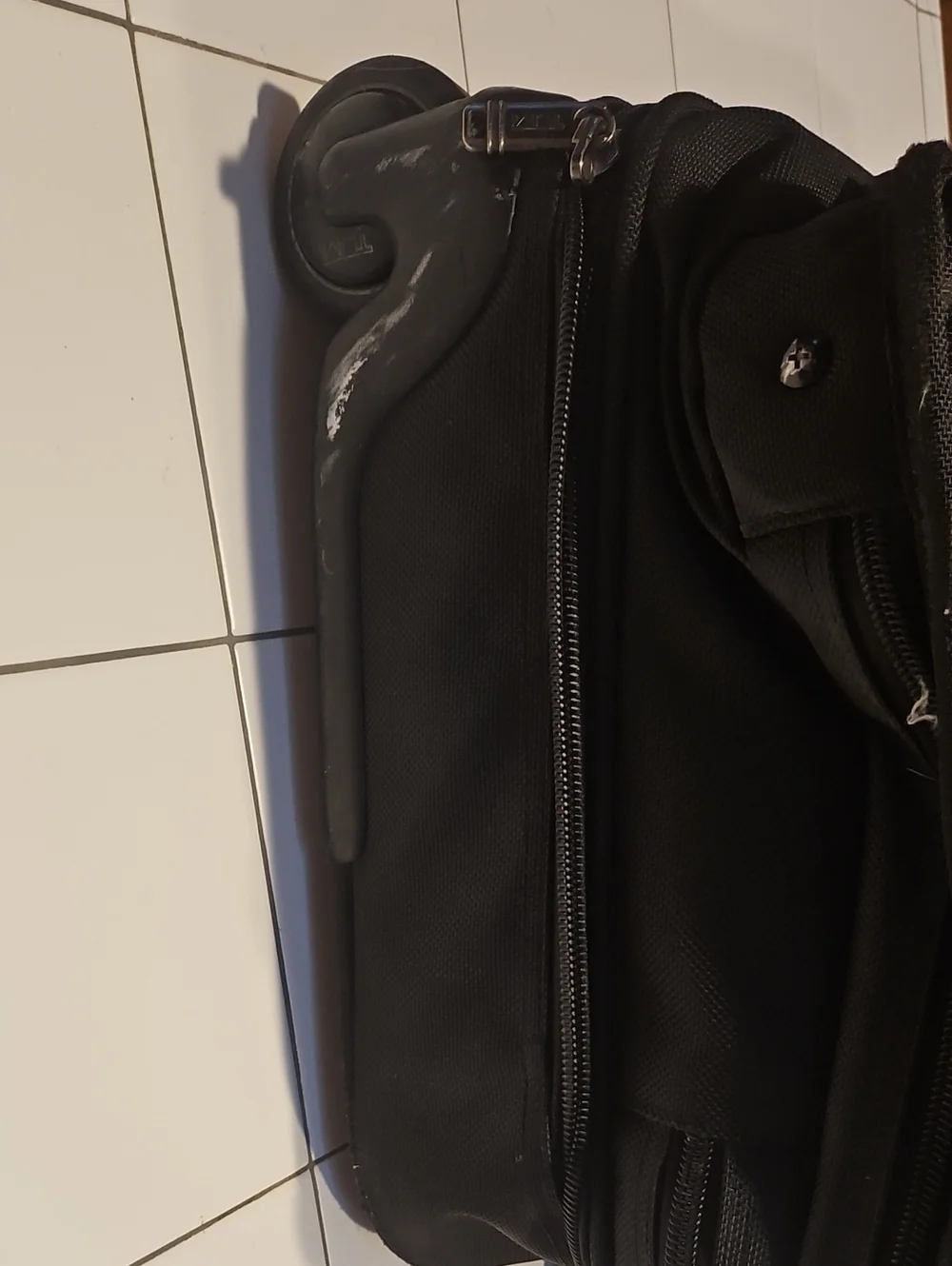 N/A tumi roller