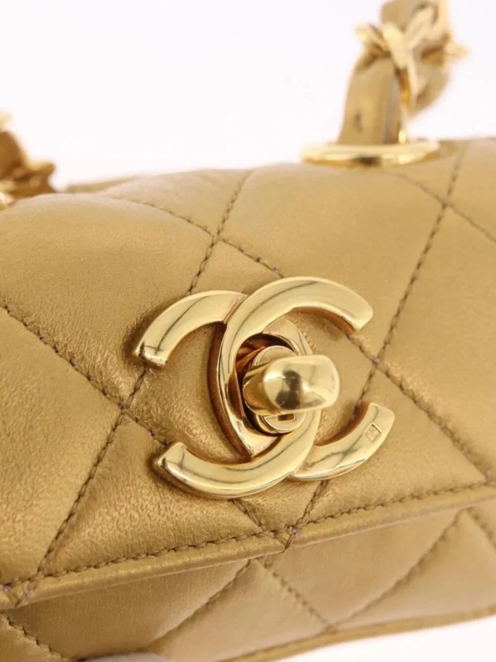 CHANEL brand	chanel color	gold