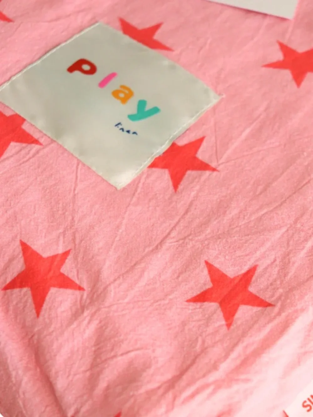 Play linen pink star