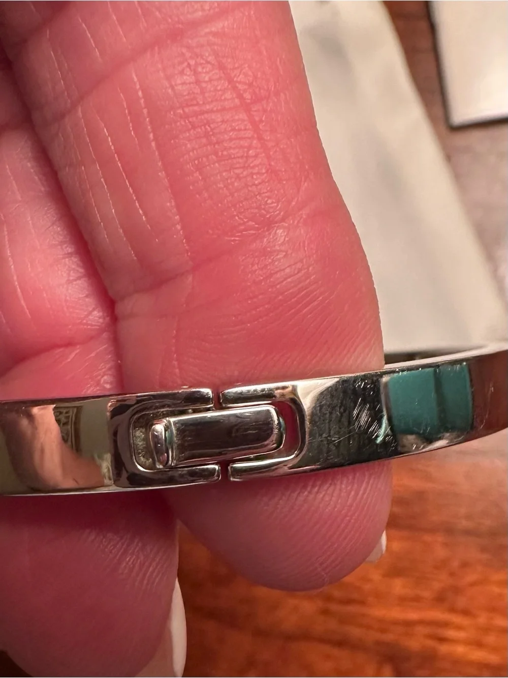 Coach polished silver