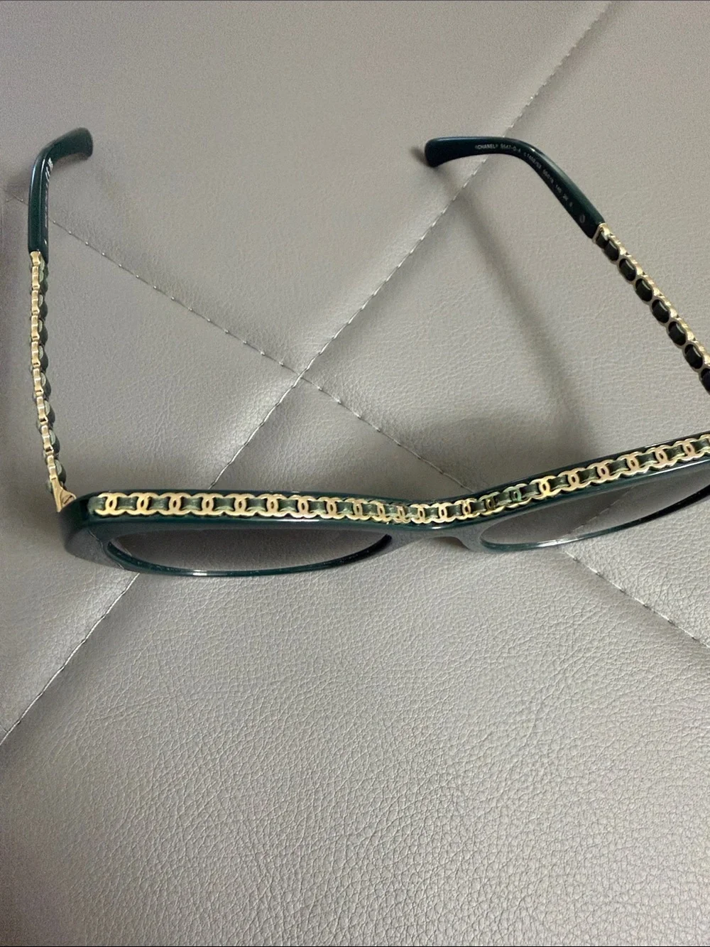 Chanel sunglasses. 100 percent authentic. Dark green with gold accents.