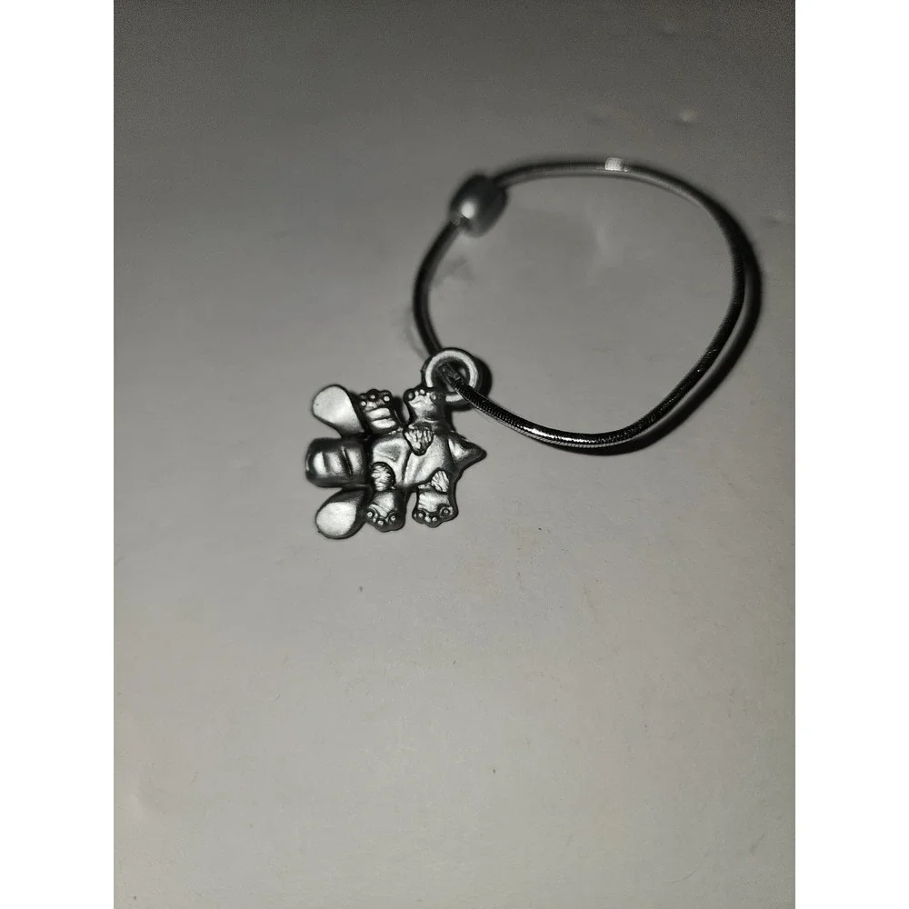 Vintage Plastic Pound‎ Puppies Charm