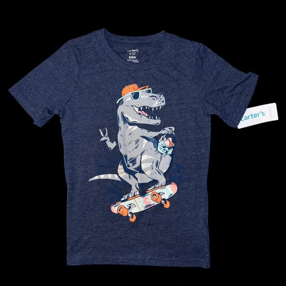 Carter's short-sleeve t-shirt with a‎ graphic print of dinosaur on a skateboard