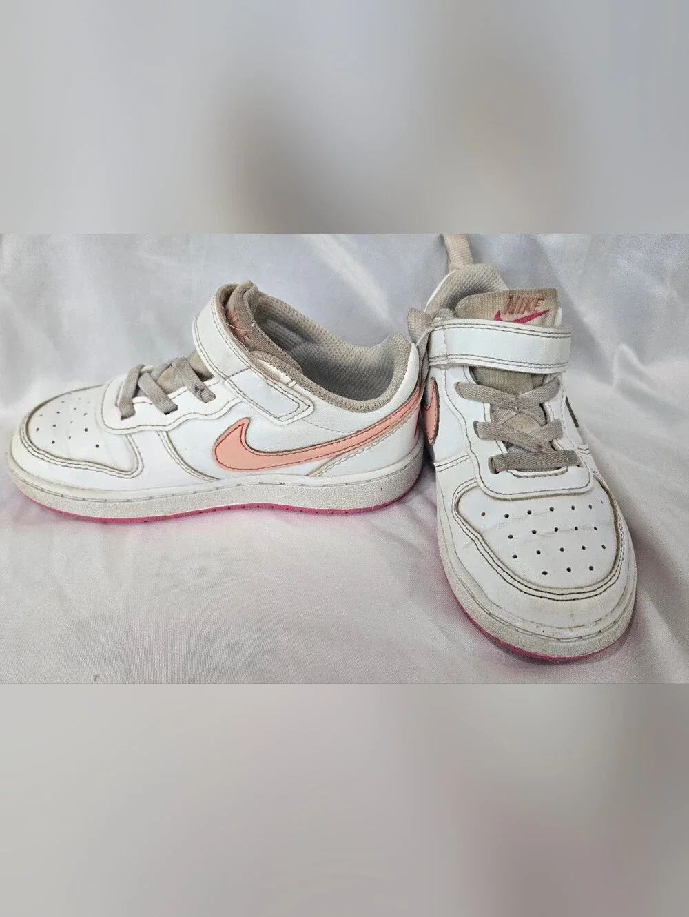 Nike Kids White Sneakers with Pink Swoosh and Pink Outsole