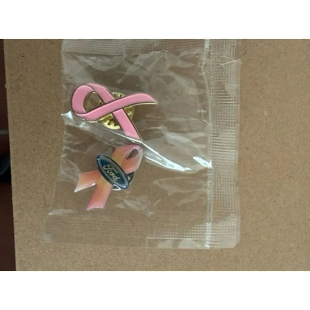 Pink Ribbon label pins one with FORD in center