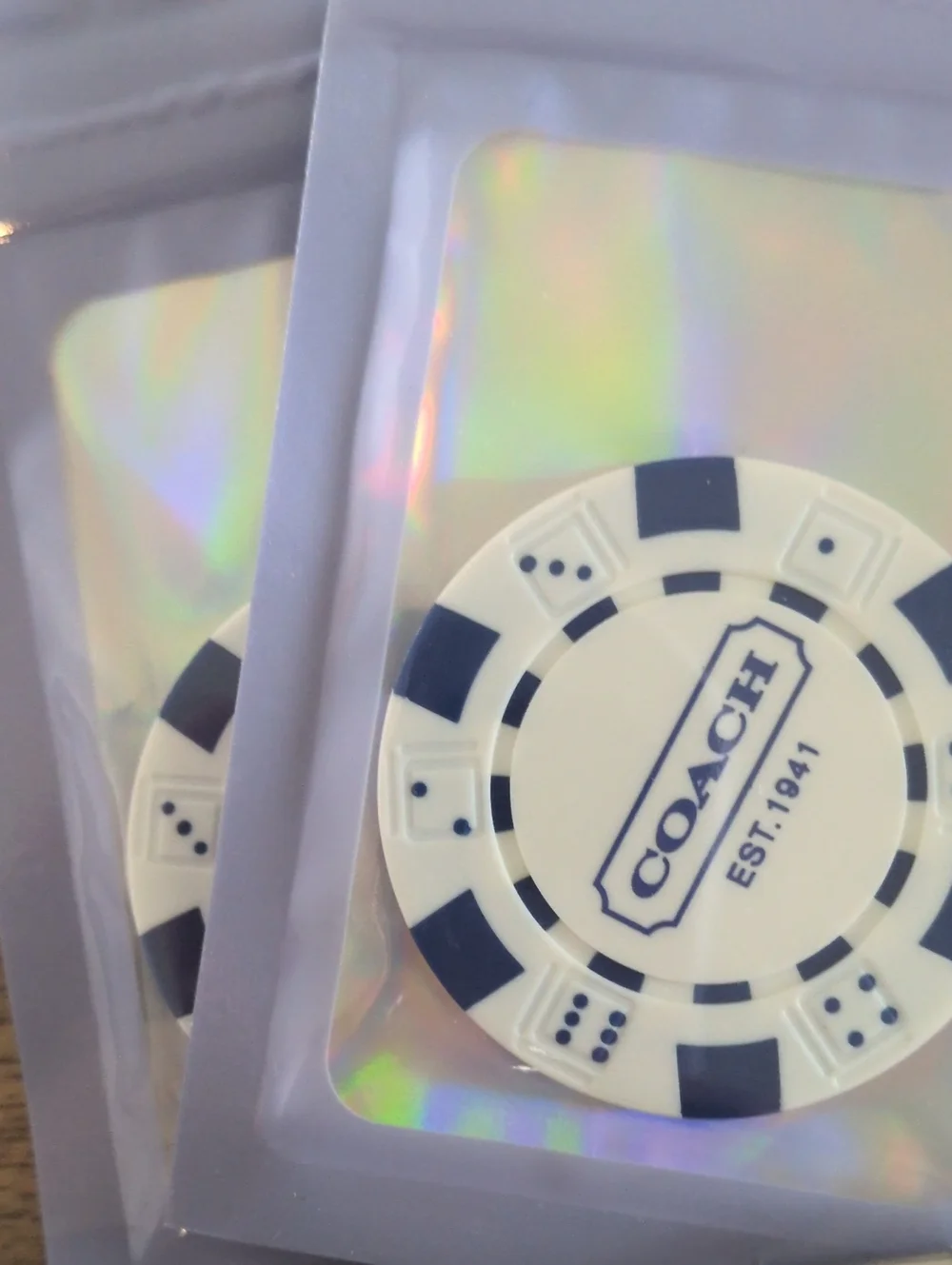 Coach branded poker