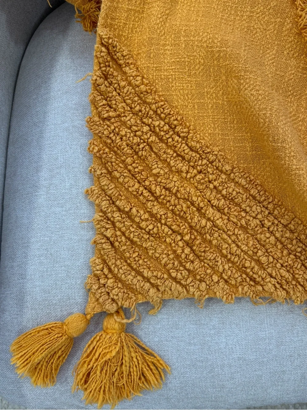 Urban Outfitters Aden Tufted Throw Blanket in Mustard